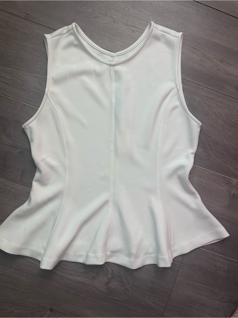 White Sleeveless Peplum Top